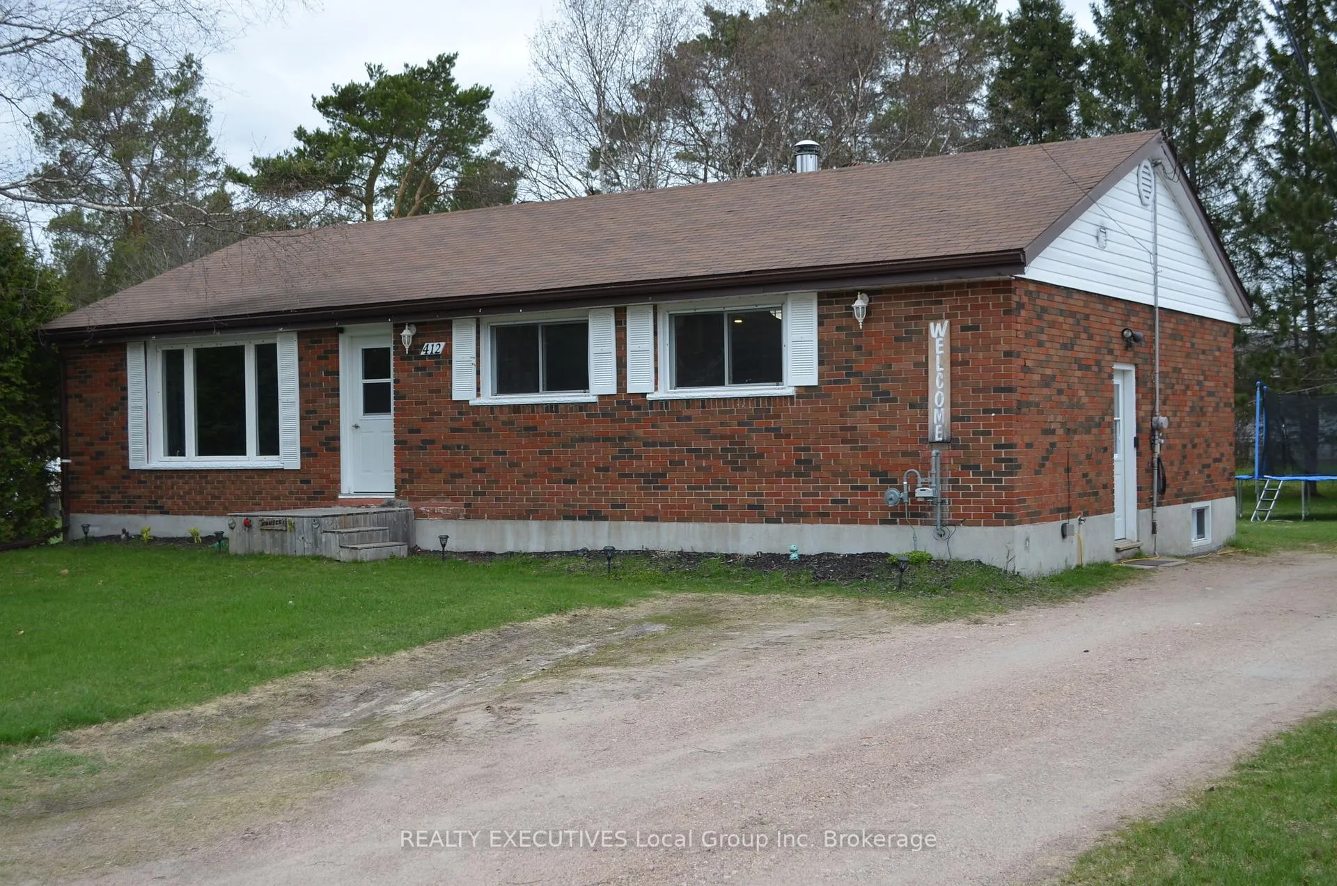 Photo 3 of 412 Sweezy Street W, Powassan, Trout Creek — HOMEH