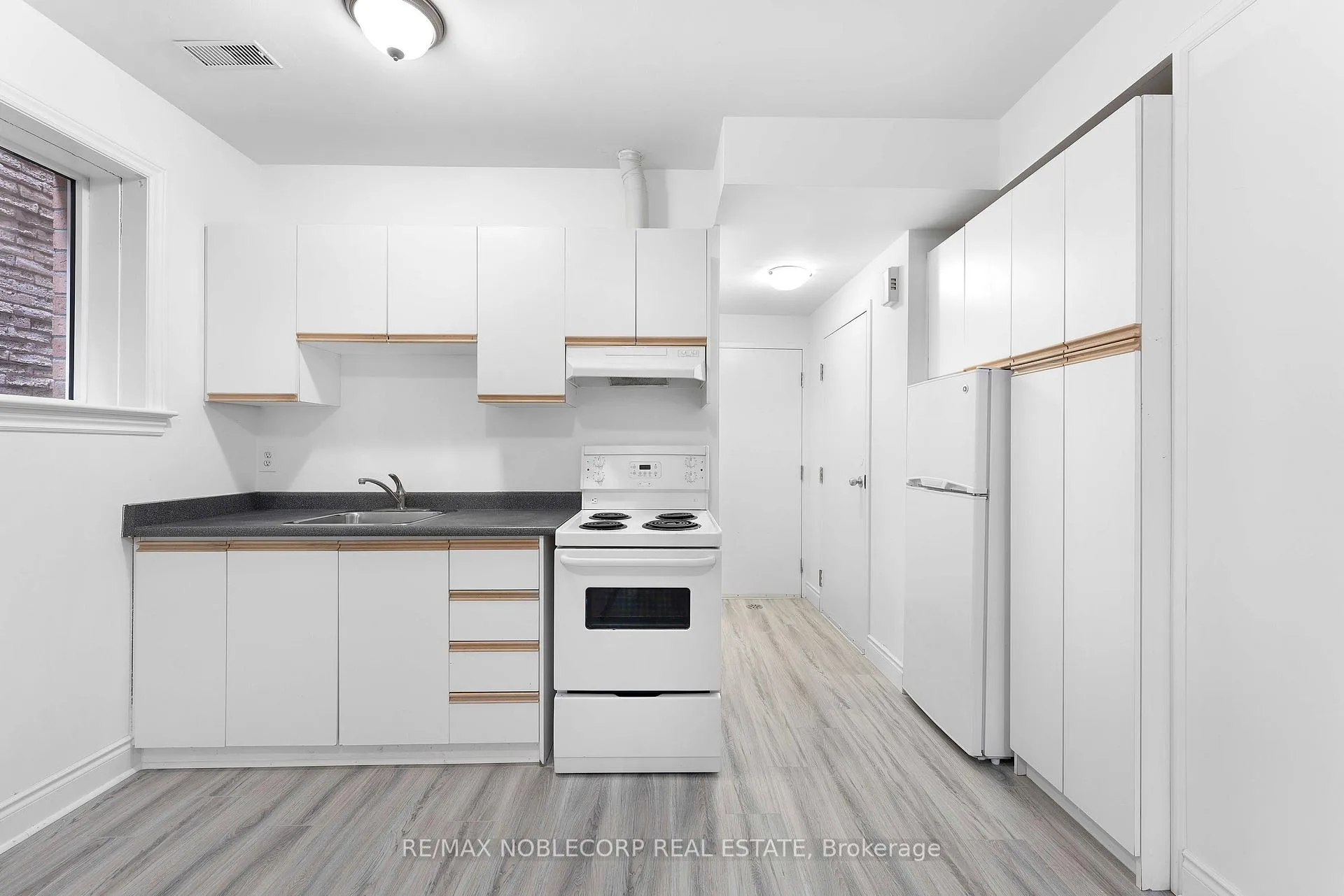 Photo 3 of Unit Basement, 67 Florence Crescent, Toronto, Rockcliffe-Smythe — HOMEH