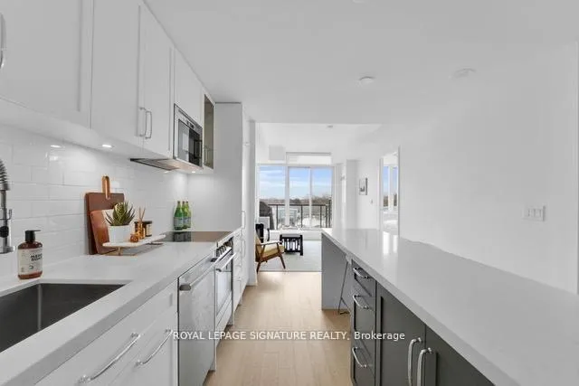 Photo 4 of Unit 408, 25 Malcolm Road, Toronto, Leaside — HOMEH