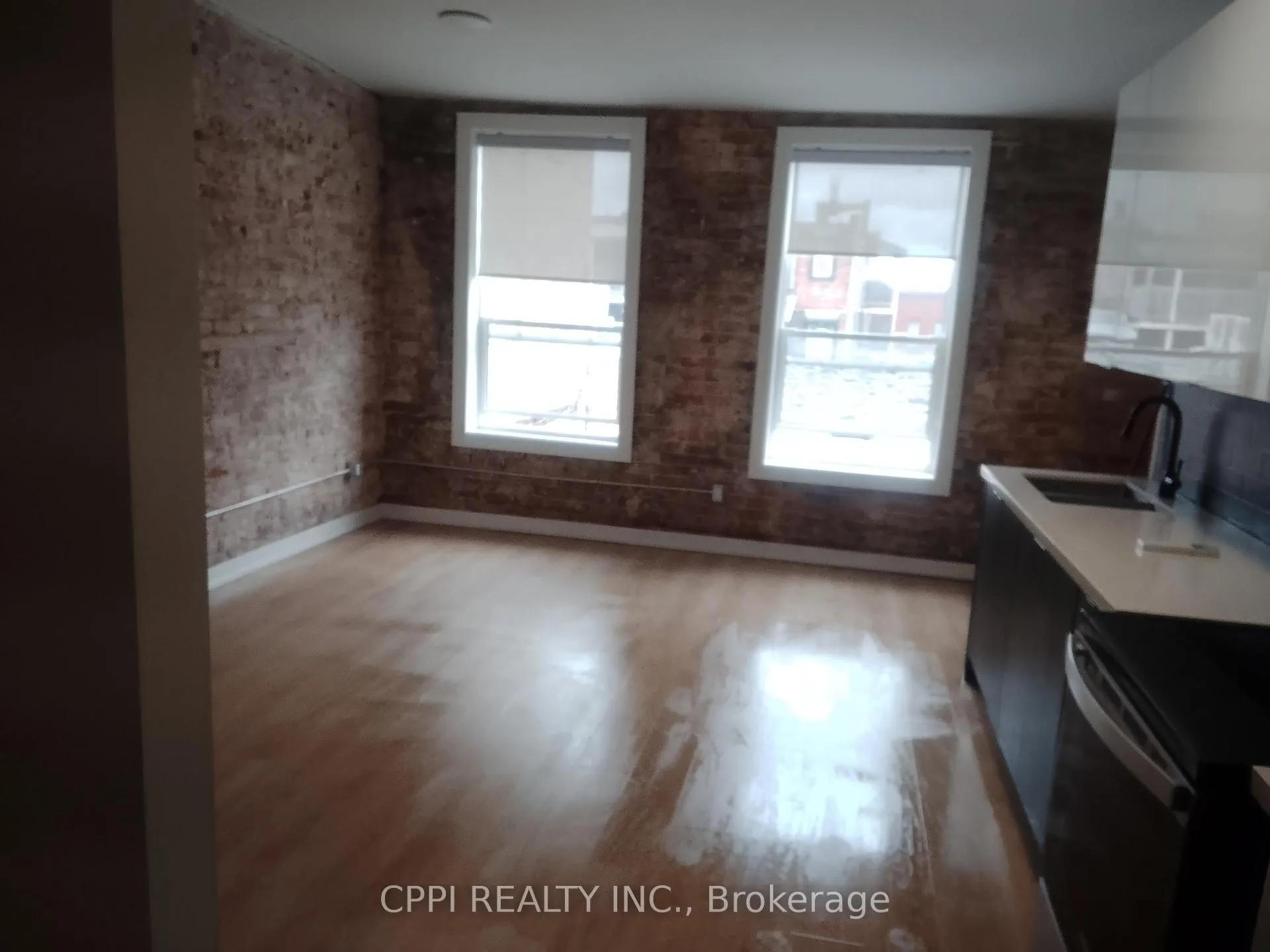 Photo 2 of Unit 310, 140 Simcoe Street, Peterborough, Town Ward 3 — HOMEH