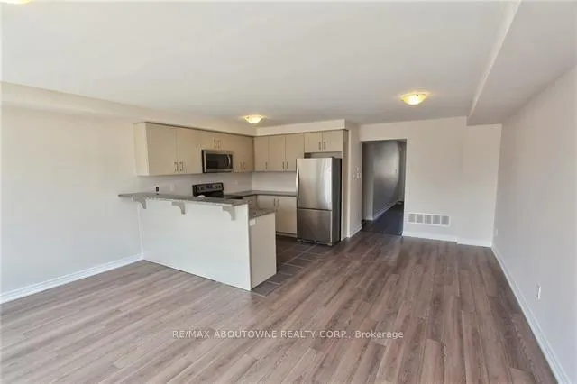 Photo 6 of 81 Pettitt Drive, Guelph, Grange Road — HOMEH