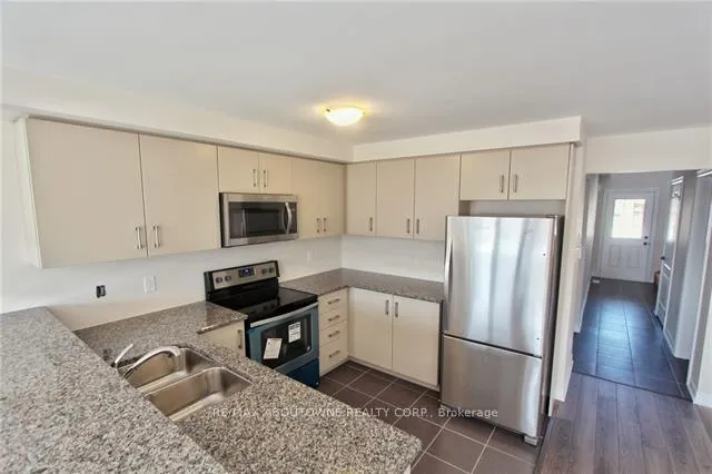 Photo 8 of 81 Pettitt Drive, Guelph, Grange Road — HOMEH