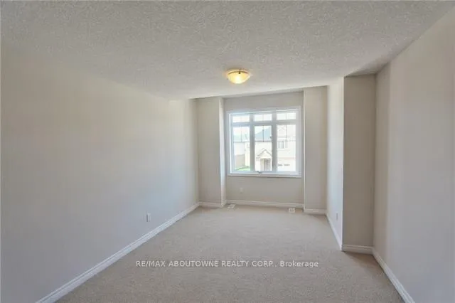 Photo 12 of 81 Pettitt Drive, Guelph, Grange Road — HOMEH