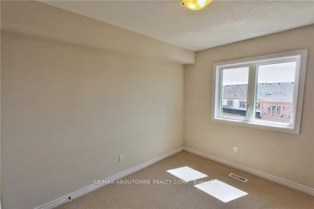 Photo 18 of 81 Pettitt Drive, Guelph, Grange Road — HOMEH