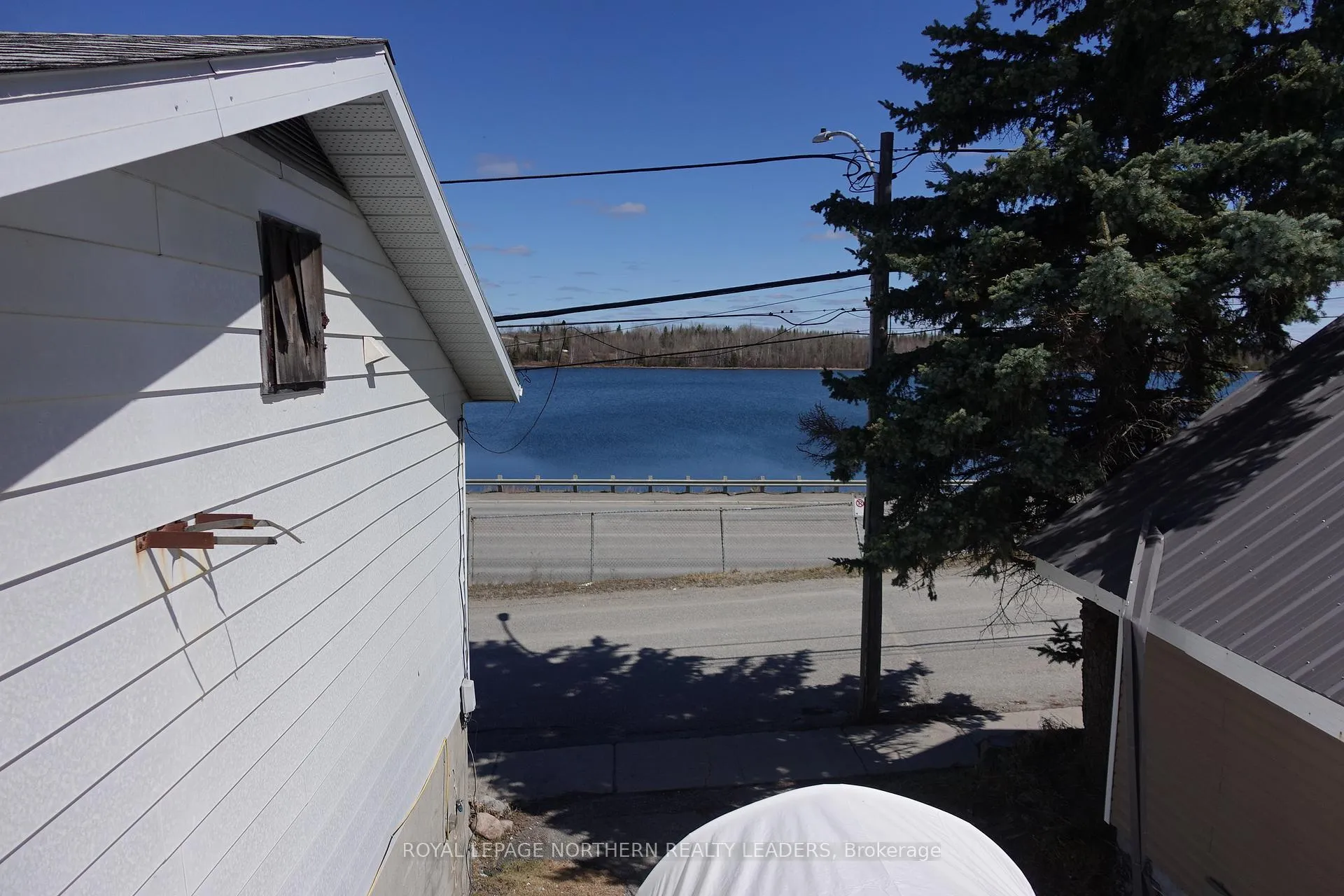 Photo 10 of 26 Lioncrest Lane, Timmins, TM - Outside East — HOMEH