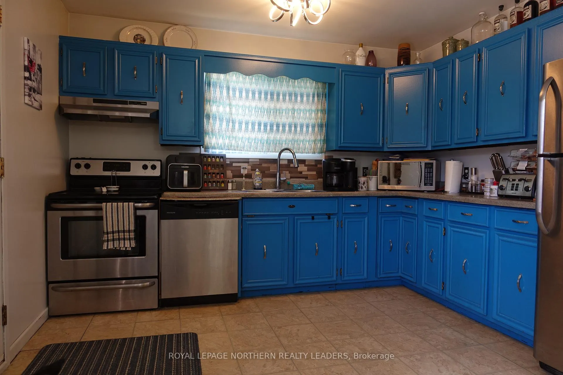 Photo 17 of 26 Lioncrest Lane, Timmins, TM - Outside East — HOMEH