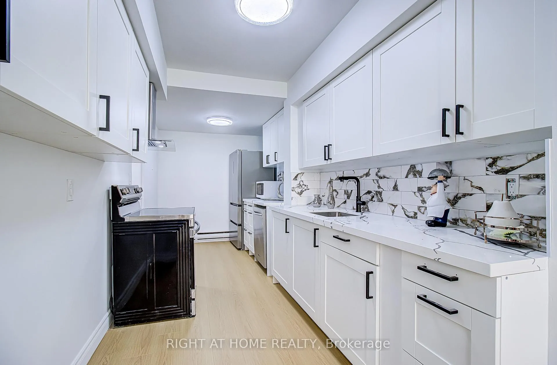 Photo 4 of Unit 409, 8 Crescent Town Road, Toronto, Crescent Town — HOMEH