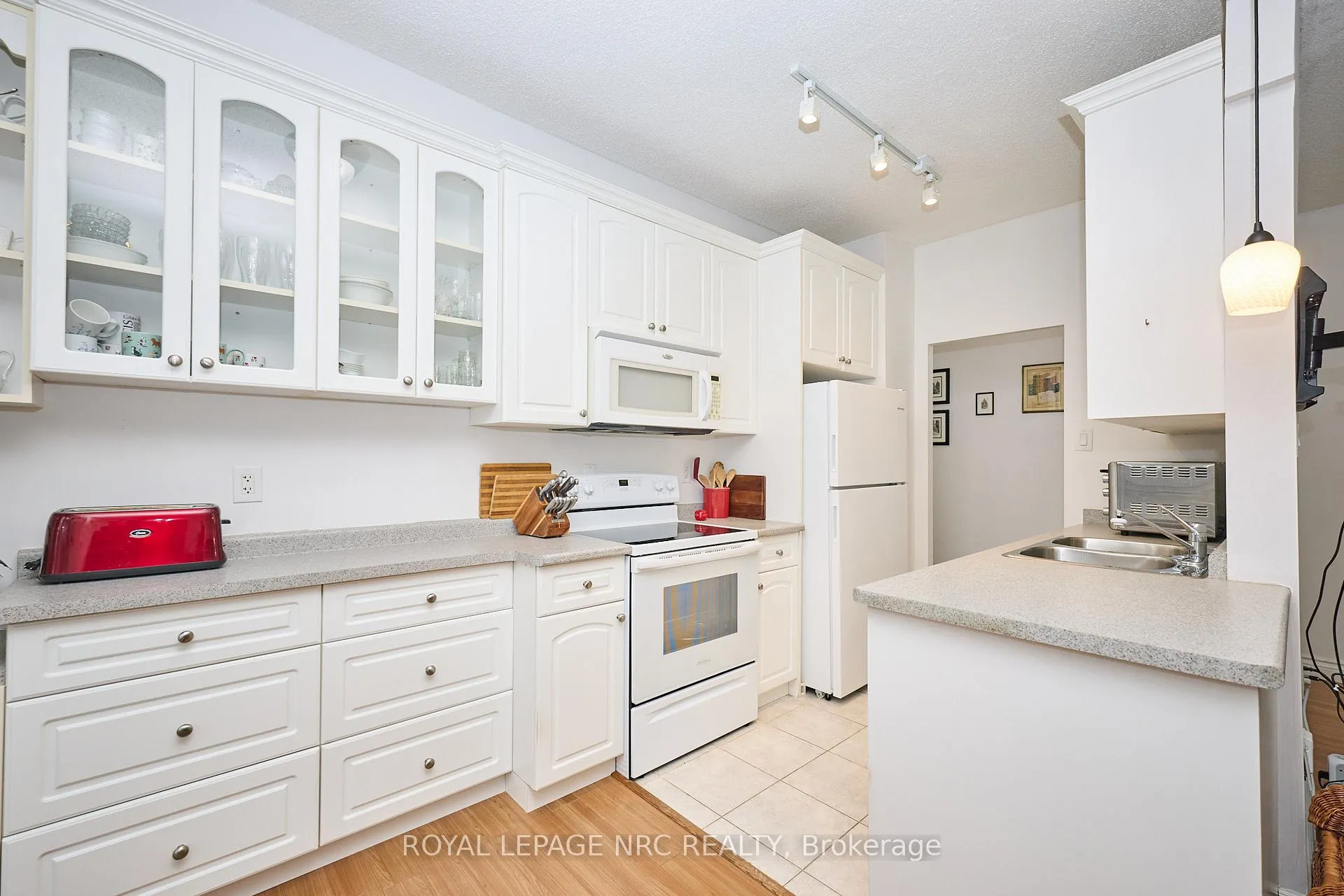 Photo 3 of Unit 101, 6390 Huggins Street, Niagara Falls, Stamford — HOMEH