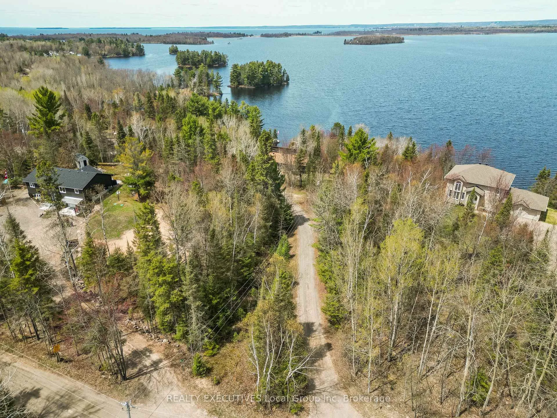 Photo 39 of 410 Pinecreek Crescent, Callander — HOMEH