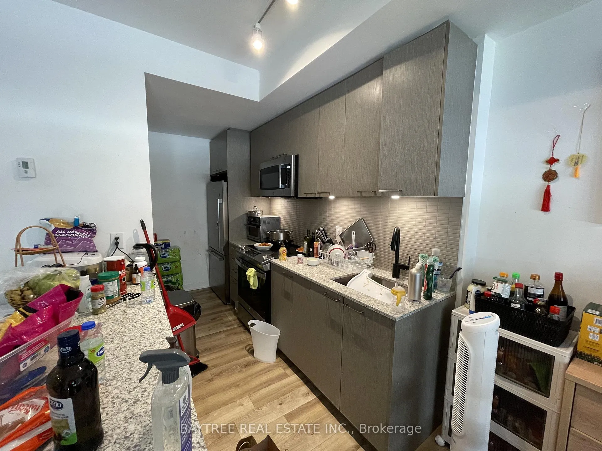 Photo 7 of Unit TH21, 40 Ed Clark Gardens, Toronto, Weston-Pellam Park — HOMEH