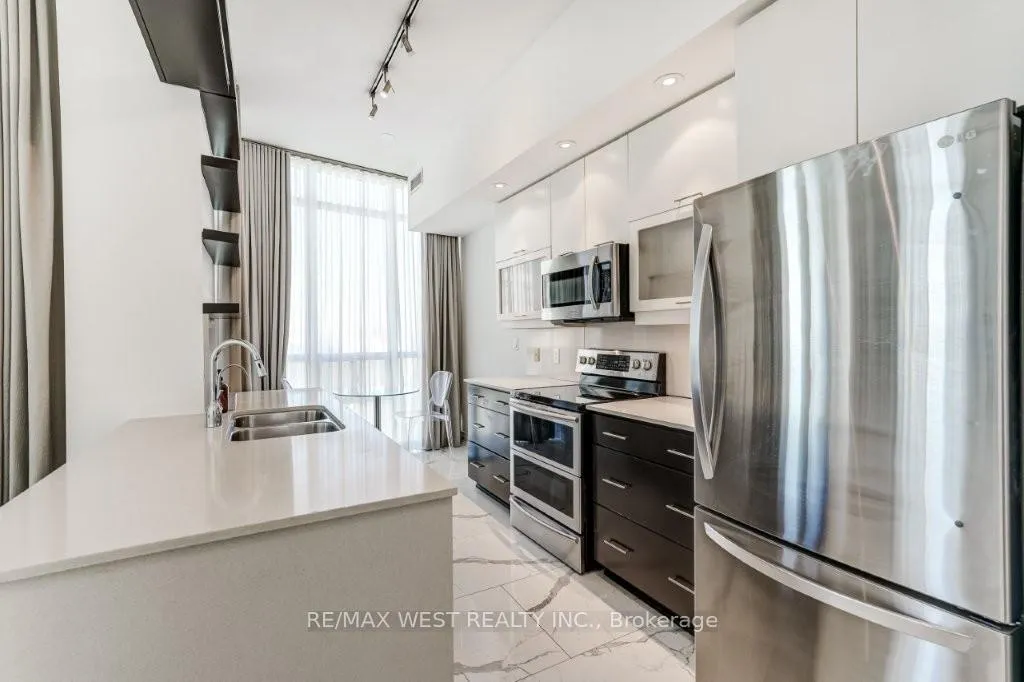Photo 11 of Unit 2506, 90 Absolute Avenue, Mississauga, City Centre — HOMEH