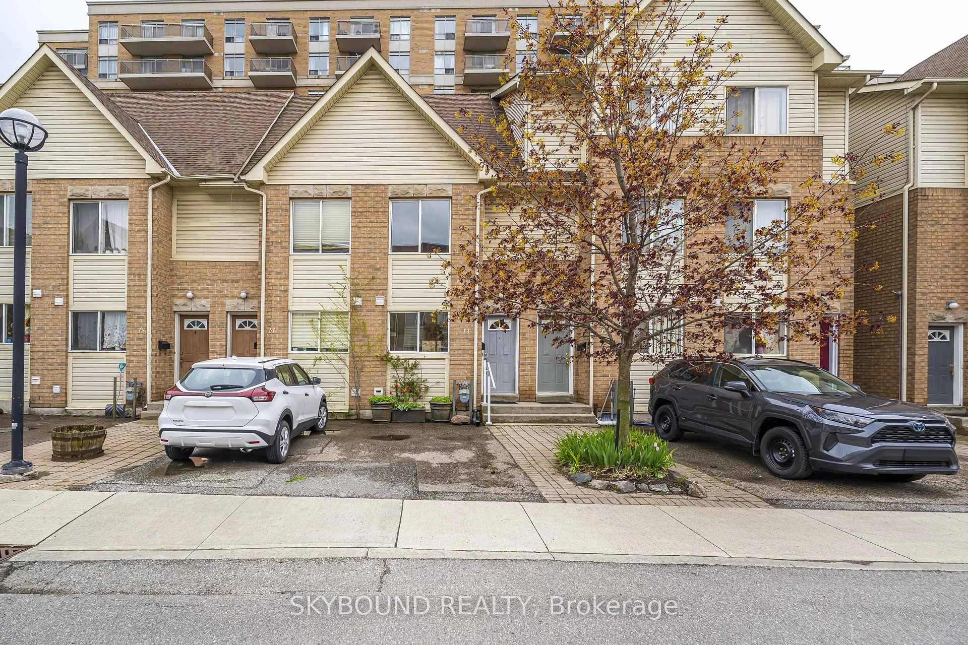 Photo 1 of Unit # 13, 25 Replin Road, Toronto, Englemount-Lawrence — HOMEH