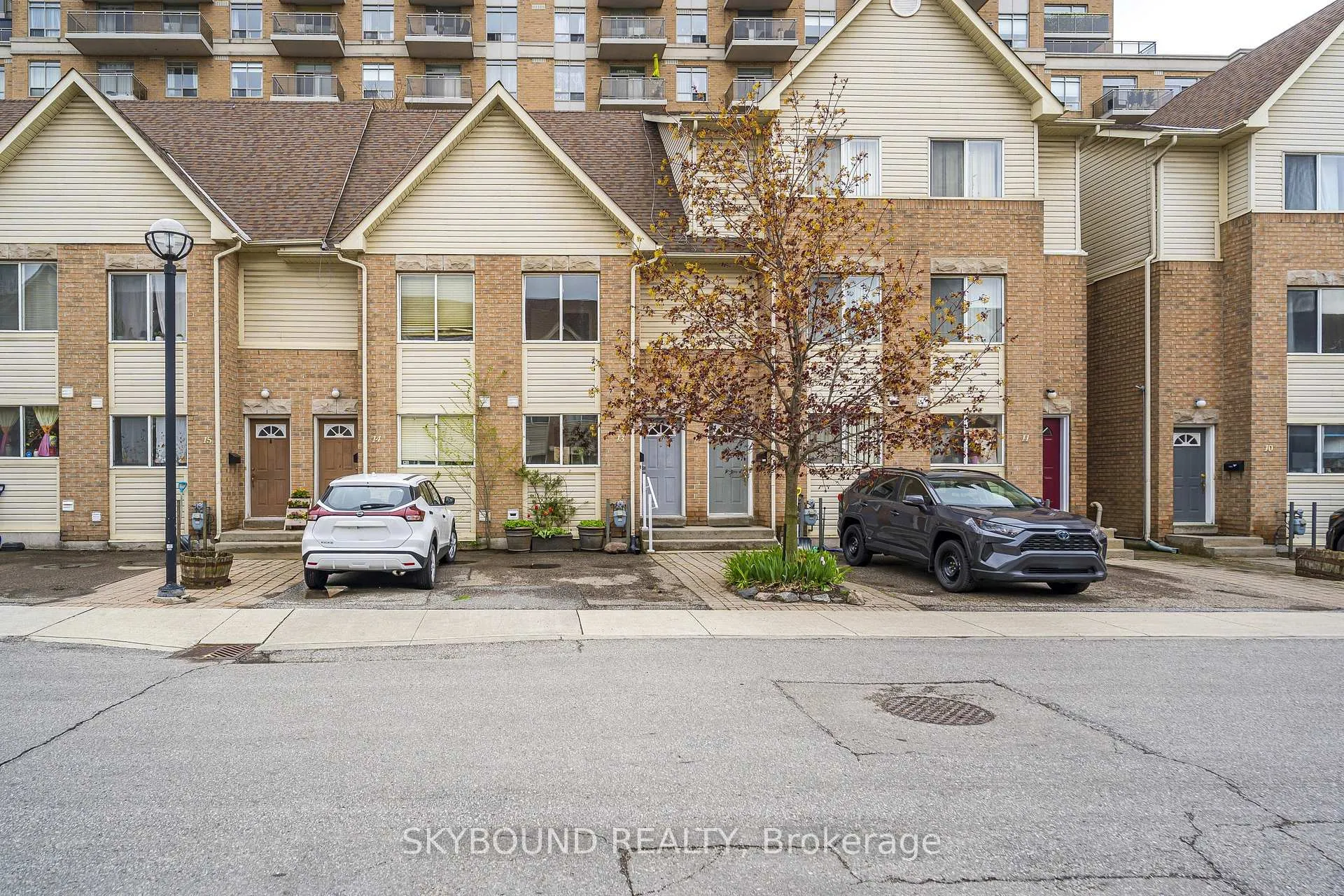 Photo 2 of Unit # 13, 25 Replin Road, Toronto, Englemount-Lawrence — HOMEH