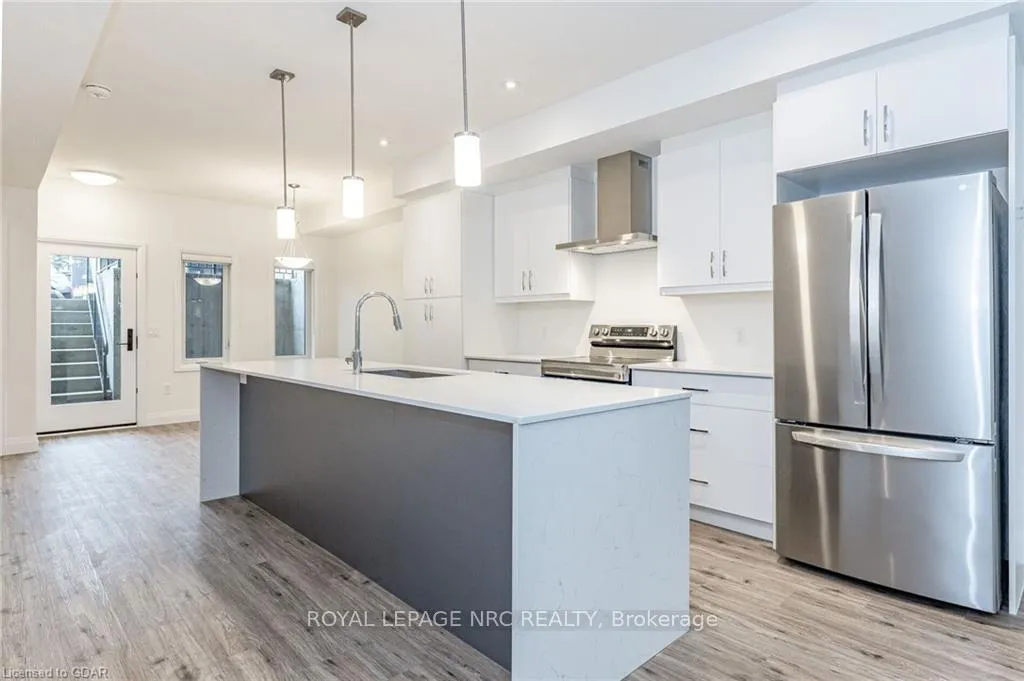 Photo 12 of 47 Lily Lane, Guelph, Clairfields/Hanlon Business Park — HOMEH