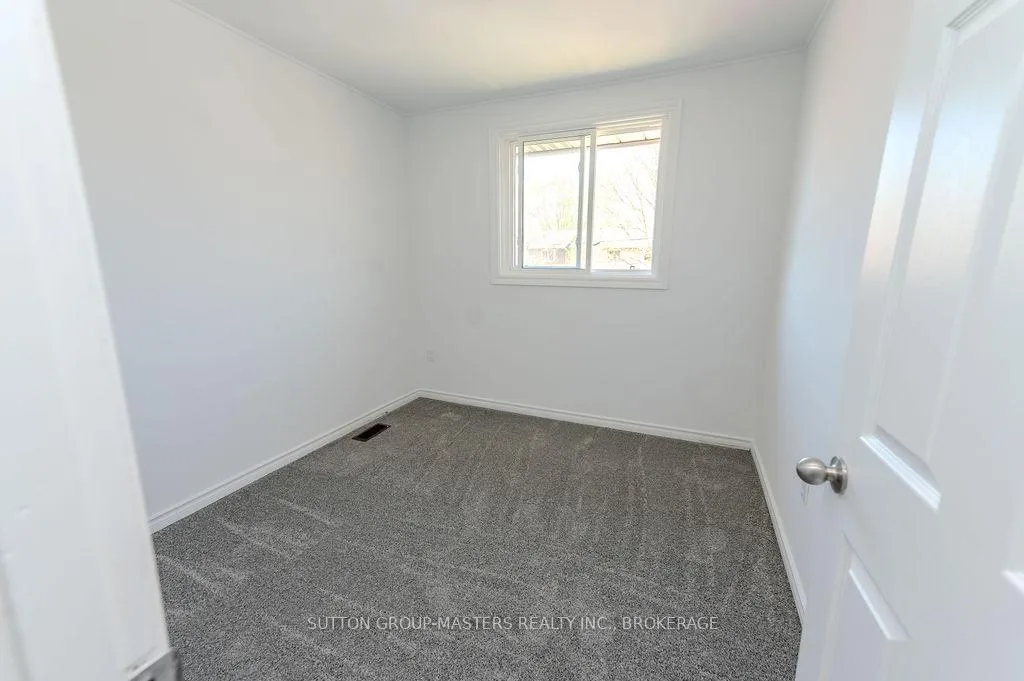 Photo 23 of Unit 2, 23 Addington Street, Loyalist, Amherstview — HOMEH