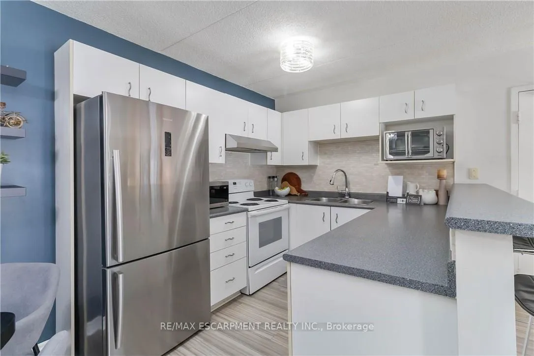 Photo 10 of Unit 110, 4015 Kilmer Drive, Burlington, Tansley — HOMEH
