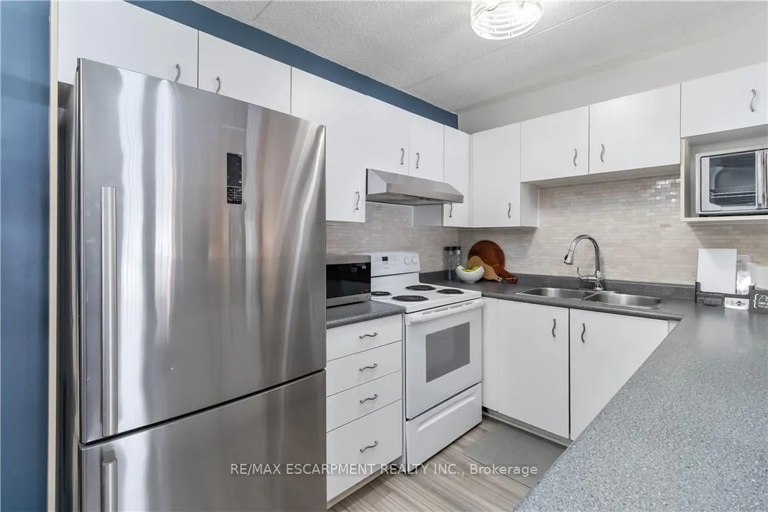 Photo 12 of Unit 110, 4015 Kilmer Drive, Burlington, Tansley — HOMEH