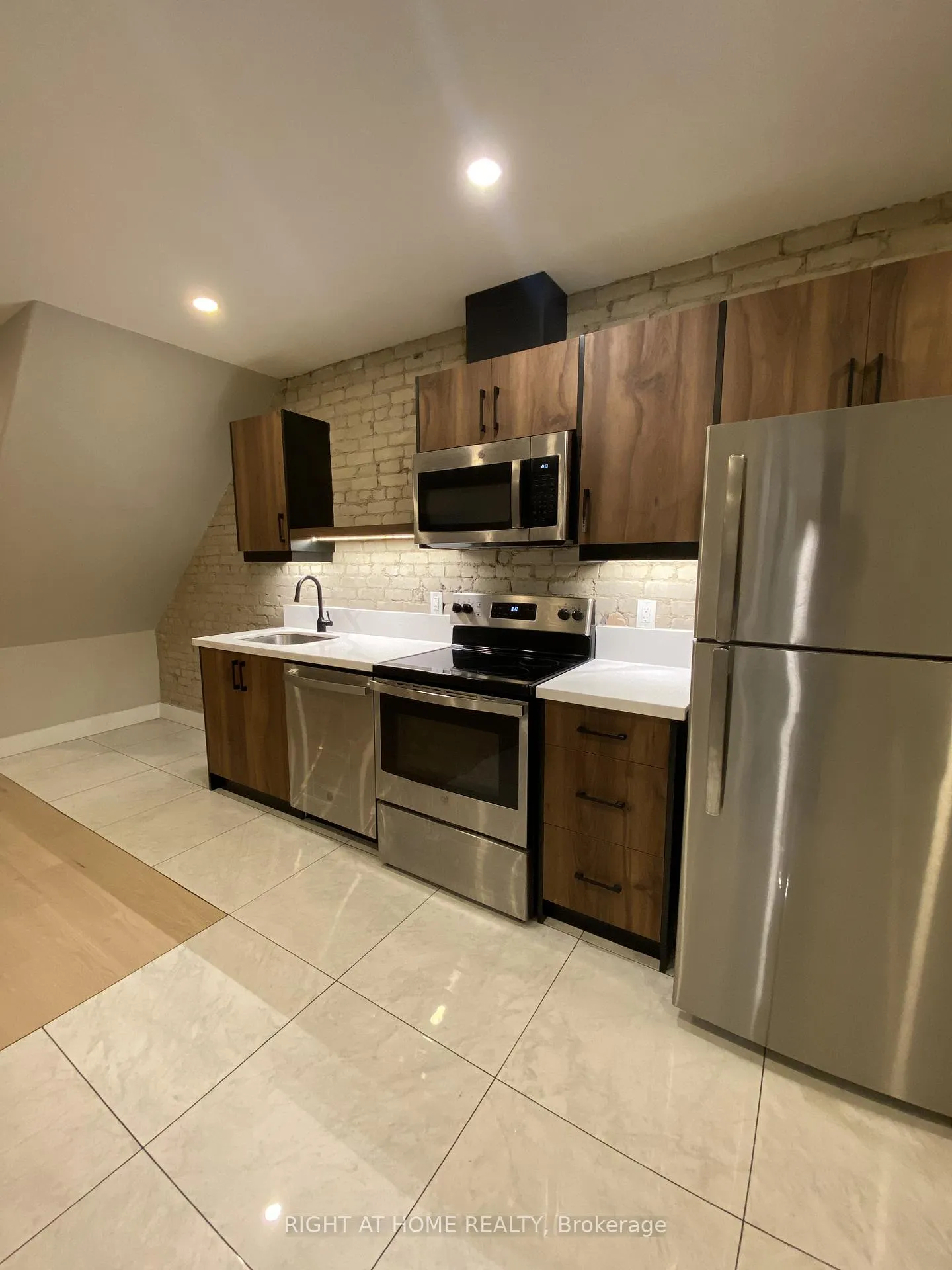 Photo 1 of Unit 1, 363 Parkside Drive, Toronto, High Park-Swansea — HOMEH