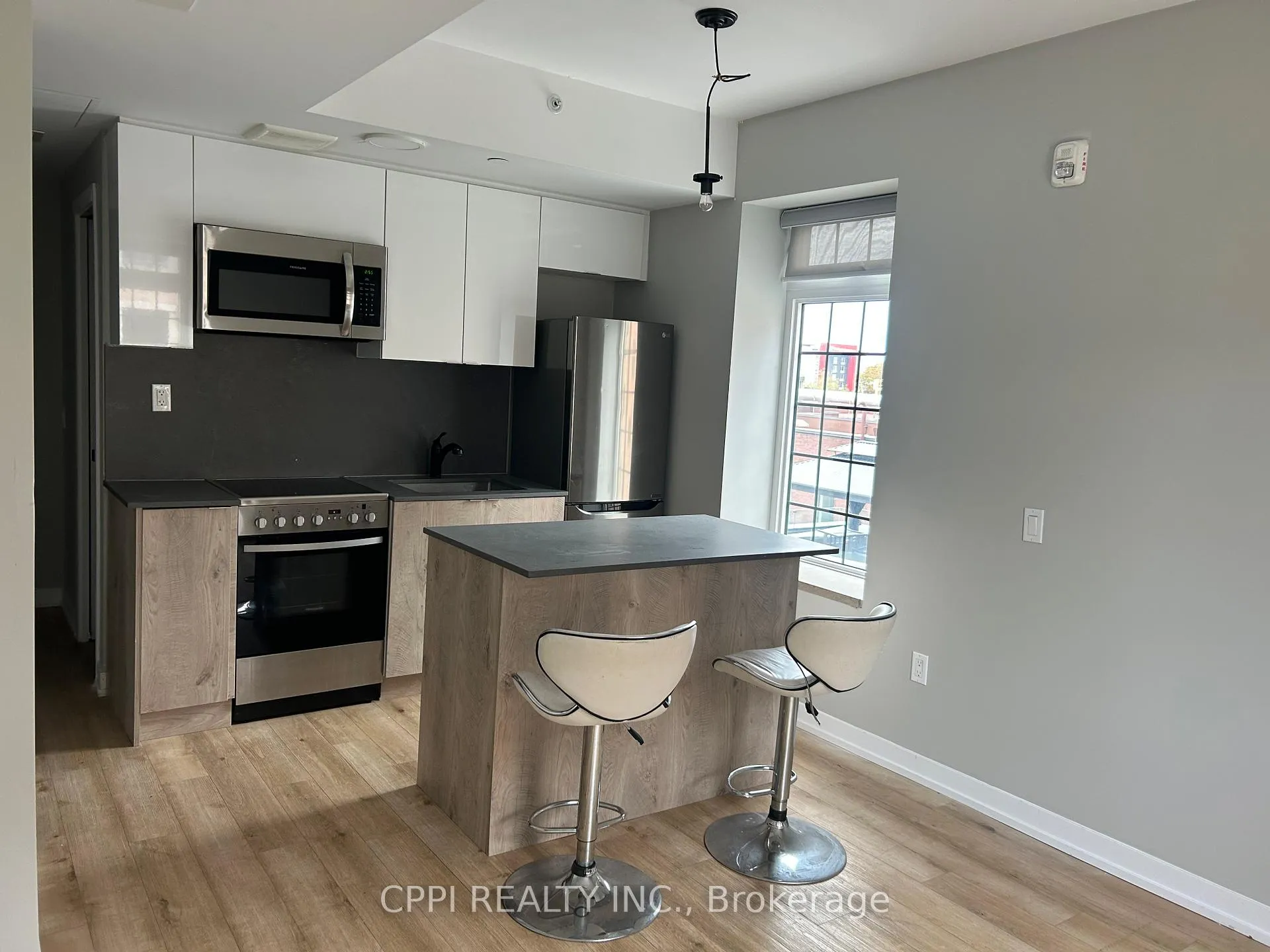 Photo 2 of Unit 413, 70 King Street E, Oshawa, Central — HOMEH