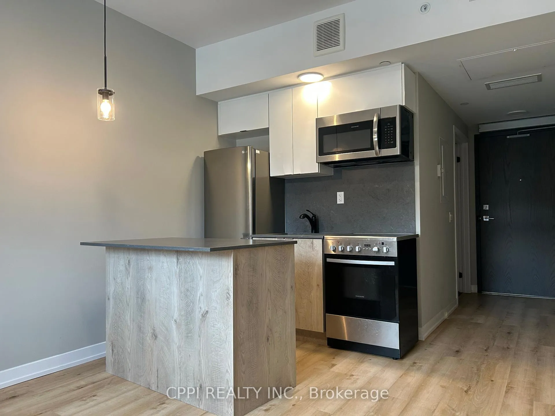 Photo 3 of Unit 202, 70 King Street E, Oshawa, Central — HOMEH