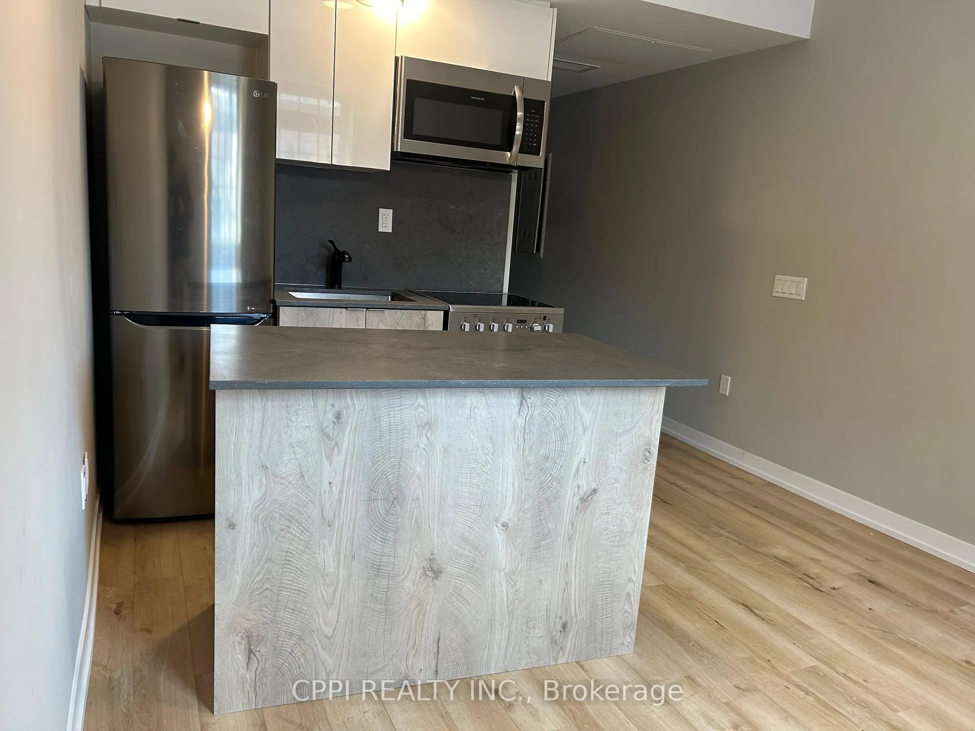 Photo 4 of Unit 202, 70 King Street E, Oshawa, Central — HOMEH