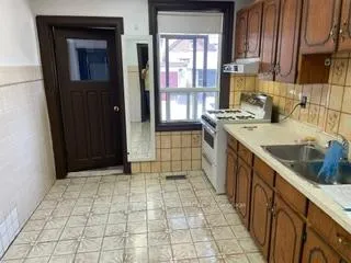 Photo 4 of Unit 1, 213 Silverthorn Avenue, Toronto, Weston-Pellam Park — HOMEH