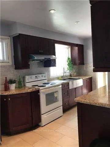 Photo 3 of Unit Upper Floor, 26 Glendower Circle, Scarborough, L'Amoreaux — HOMEH