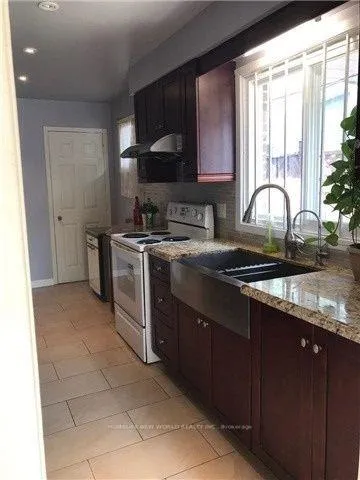 Photo 4 of Unit Upper Floor, 26 Glendower Circle, Scarborough, L'Amoreaux — HOMEH