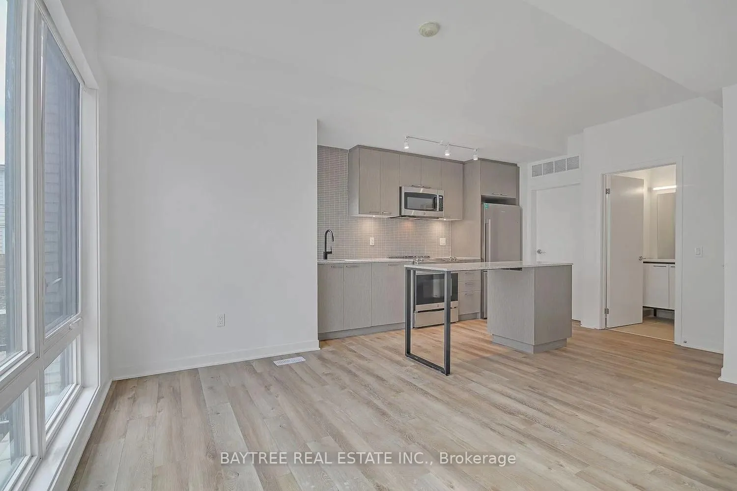 Photo 2 of Unit TH4, 30 Ed Clark Gardens, Toronto, Weston-Pellam Park — HOMEH
