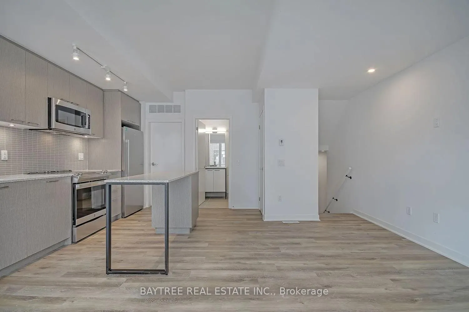 Photo 3 of Unit TH4, 30 Ed Clark Gardens, Toronto, Weston-Pellam Park — HOMEH