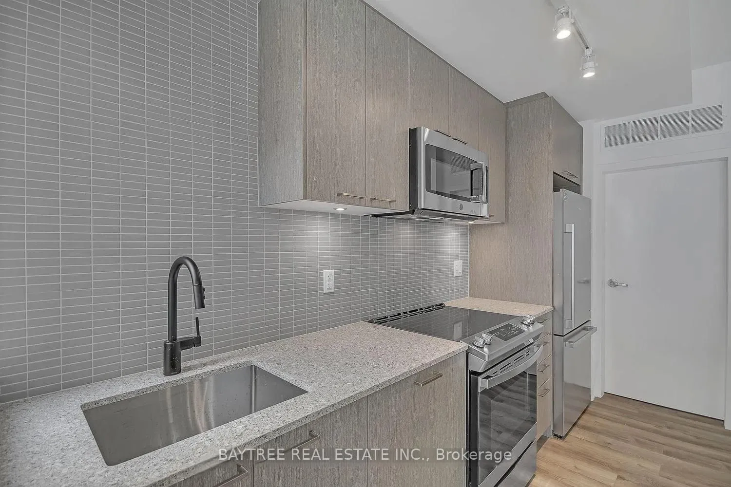 Photo 6 of Unit TH4, 30 Ed Clark Gardens, Toronto, Weston-Pellam Park — HOMEH