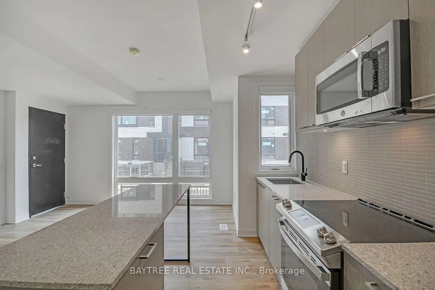 Photo 8 of Unit TH4, 30 Ed Clark Gardens, Toronto, Weston-Pellam Park — HOMEH