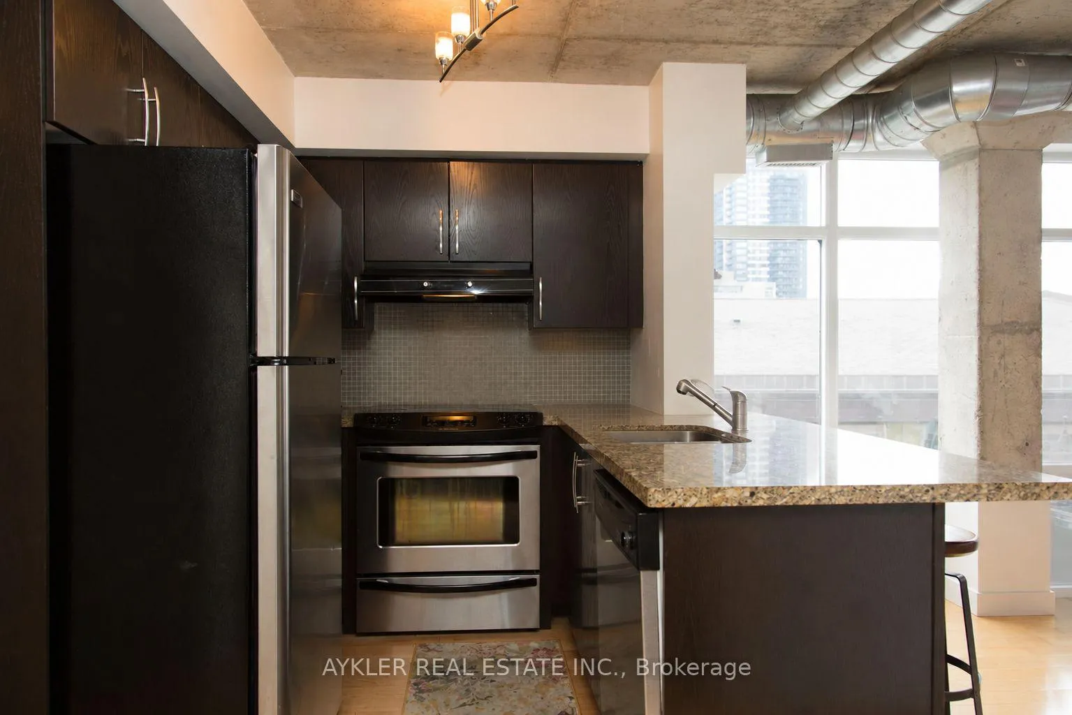 Photo 3 of Unit 502, 10 Wellesley Place, Toronto, North St. James Town — HOMEH