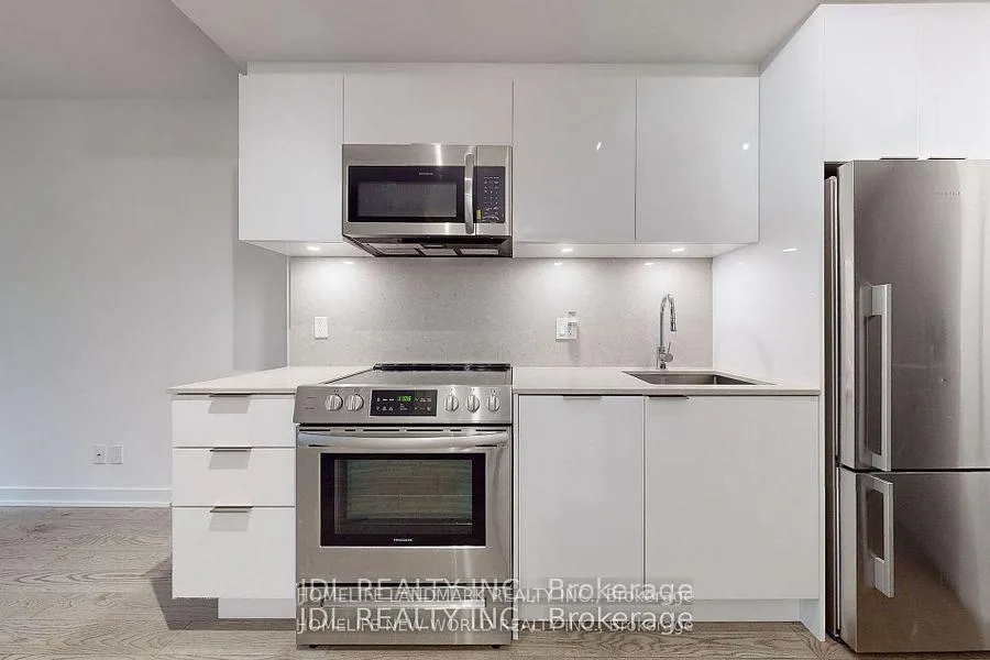 Photo 9 of Unit 408, 25 Richmond St Street E, Toronto, Church-Yonge Corridor — HOMEH