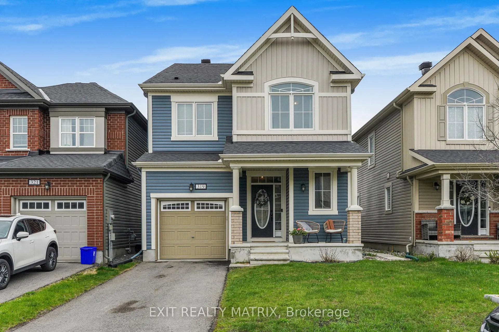 Front of 319 Sweetclover Way