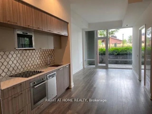 Photo 5 of Unit 103, 4800 Highway 7, Vaughan, East Woodbridge — HOMEH