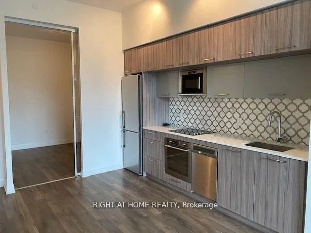Photo 6 of Unit 103, 4800 Highway 7, Vaughan, East Woodbridge — HOMEH
