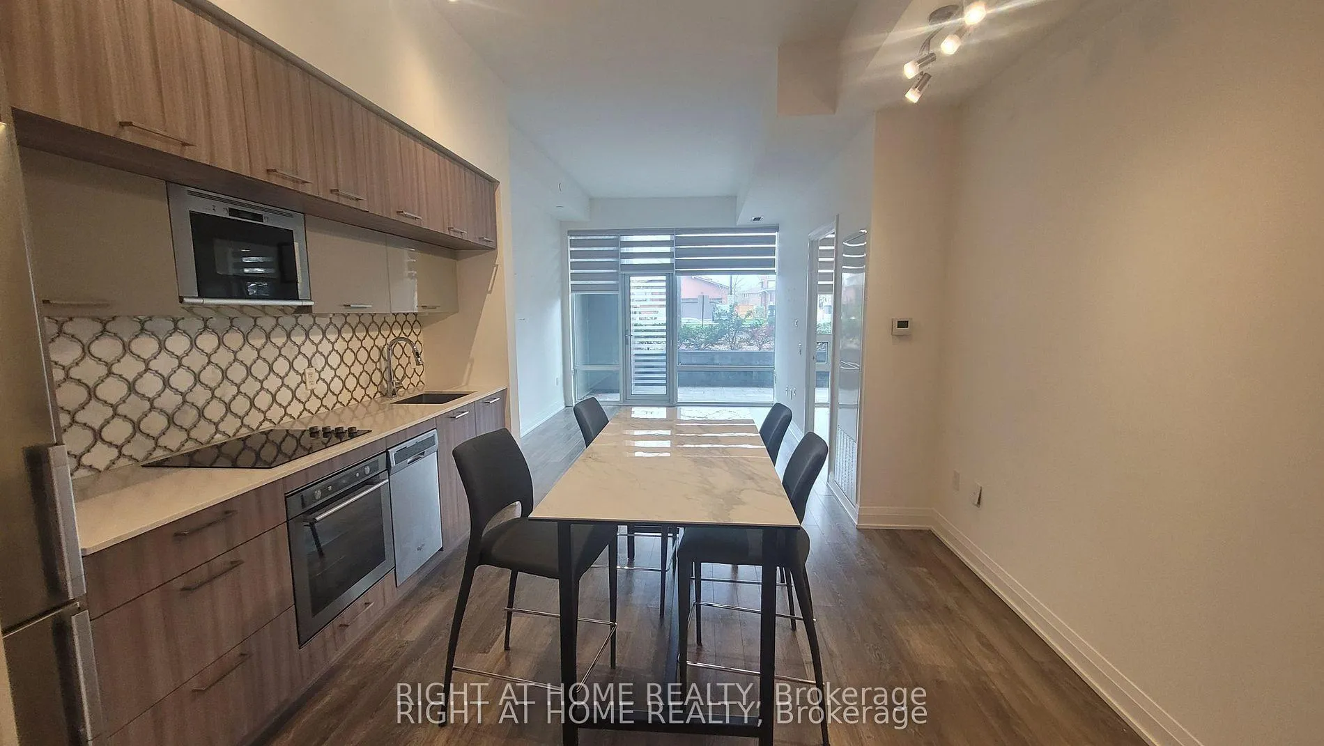 Photo 7 of Unit 103, 4800 Highway 7, Vaughan, East Woodbridge — HOMEH
