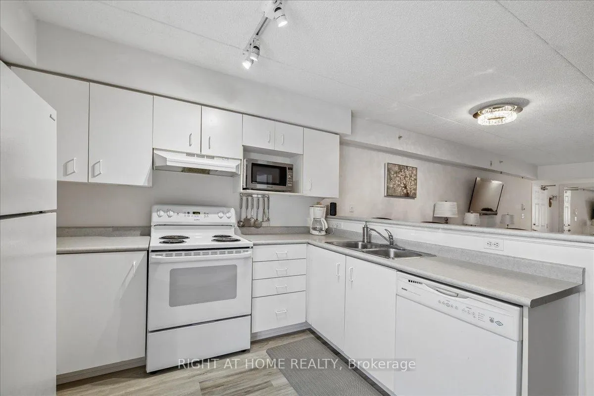 Photo 24 of Unit Unit # 312, 1451 Walker's Line, Burlington, Tansley — HOMEH