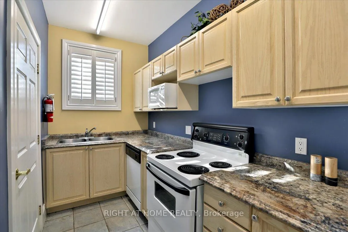 Photo 45 of Unit Unit # 312, 1451 Walker's Line, Burlington, Tansley — HOMEH