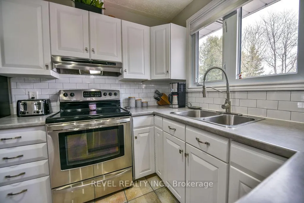 Photo 9 of 634 Tamarack Street, Timmins, TNE - North — HOMEH