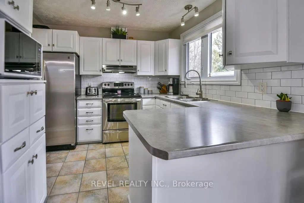 Photo 11 of 634 Tamarack Street, Timmins, TNE - North — HOMEH