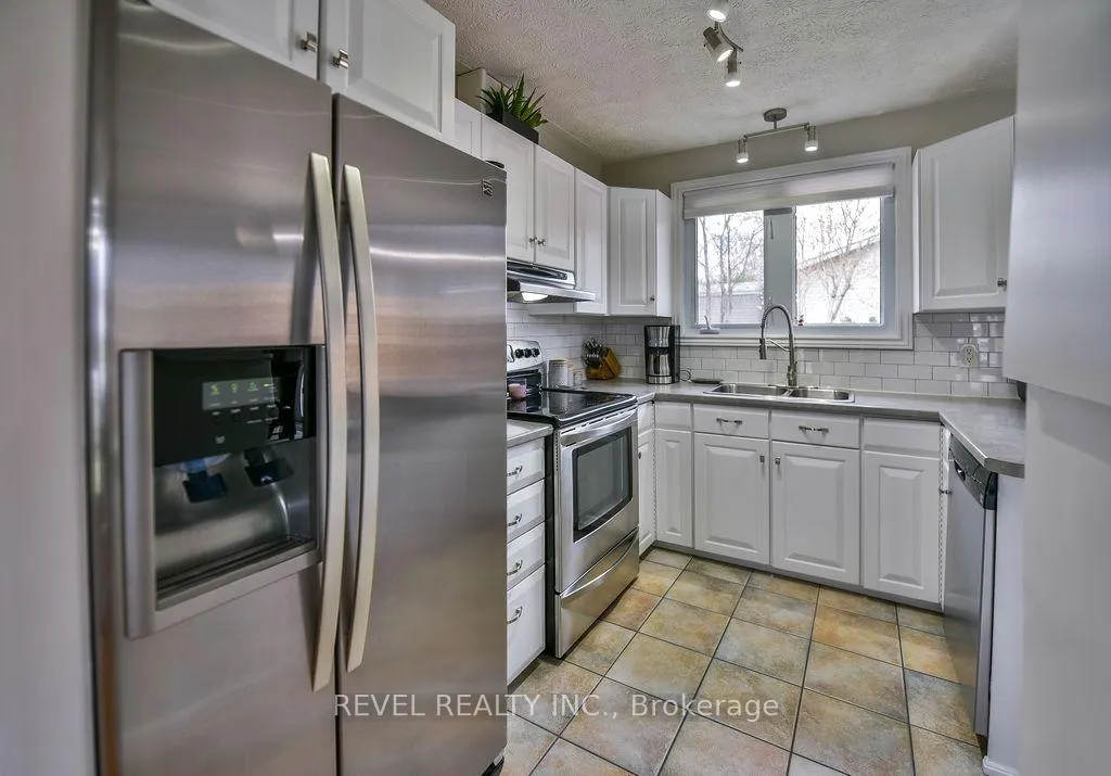 Photo 12 of 634 Tamarack Street, Timmins, TNE - North — HOMEH