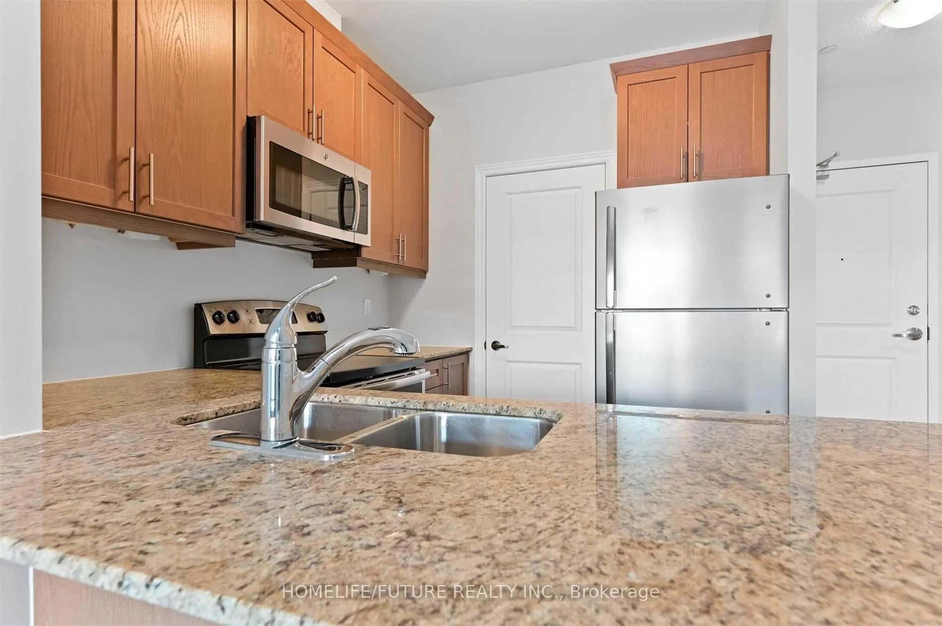 Photo 3 of Unit 101, 7768 Kennedy Road, Markham, Milliken Mills West — HOMEH