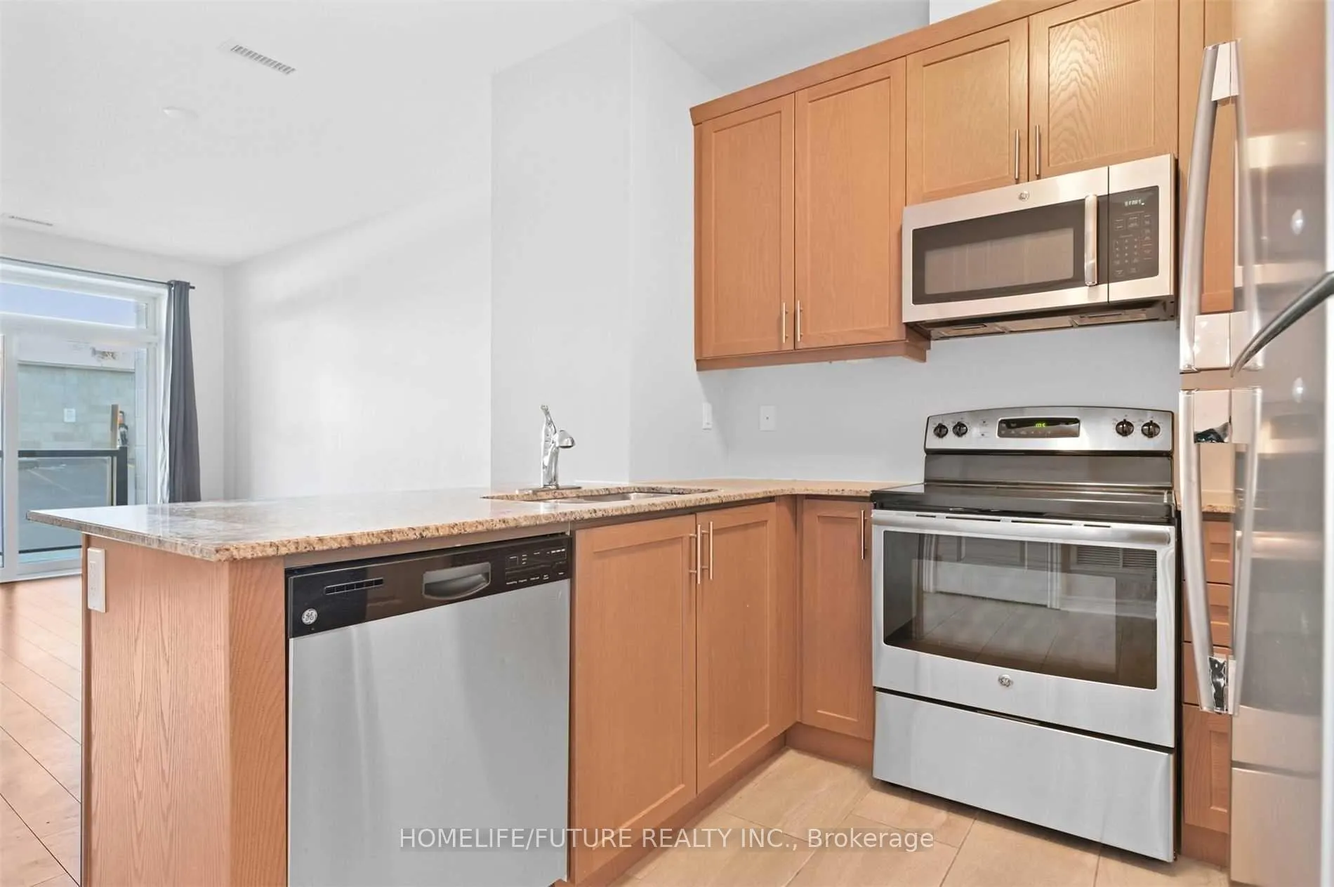Photo 4 of Unit 101, 7768 Kennedy Road, Markham, Milliken Mills West — HOMEH