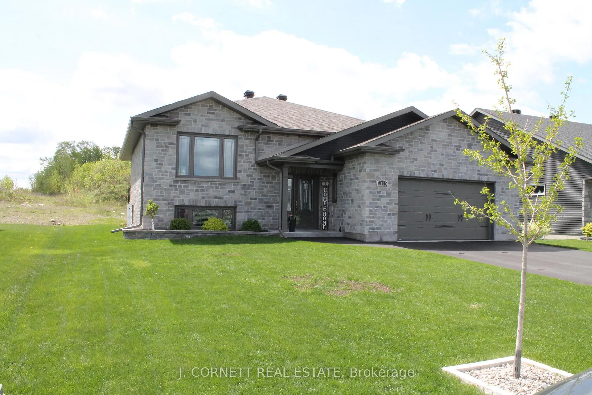 Photo 2 of 2140 Burke Avenue E, Cornwall — HOMEH