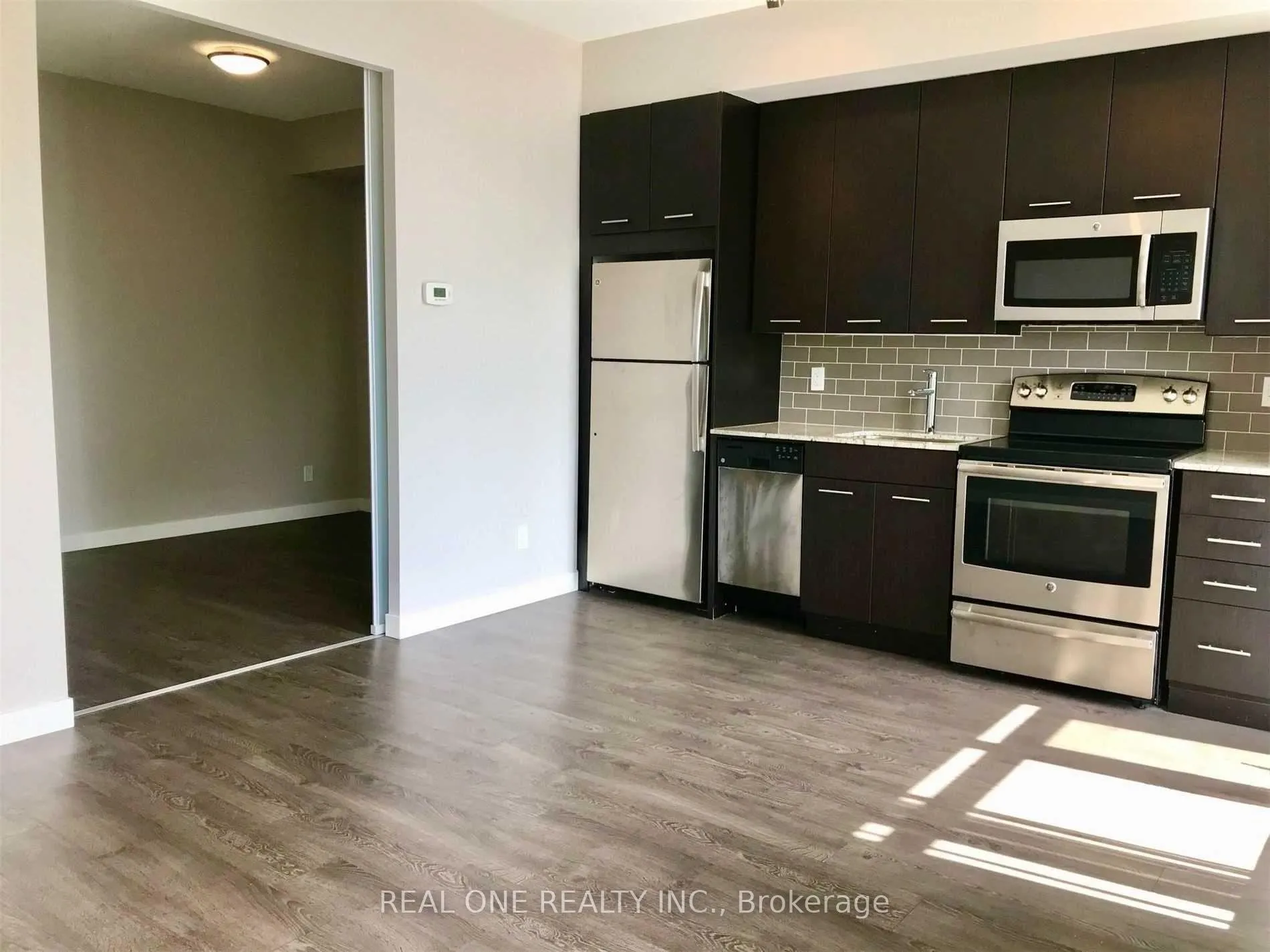 Photo 3 of Unit 312, 2055 Danforth Avenue, Toronto, Woodbine Corridor — HOMEH