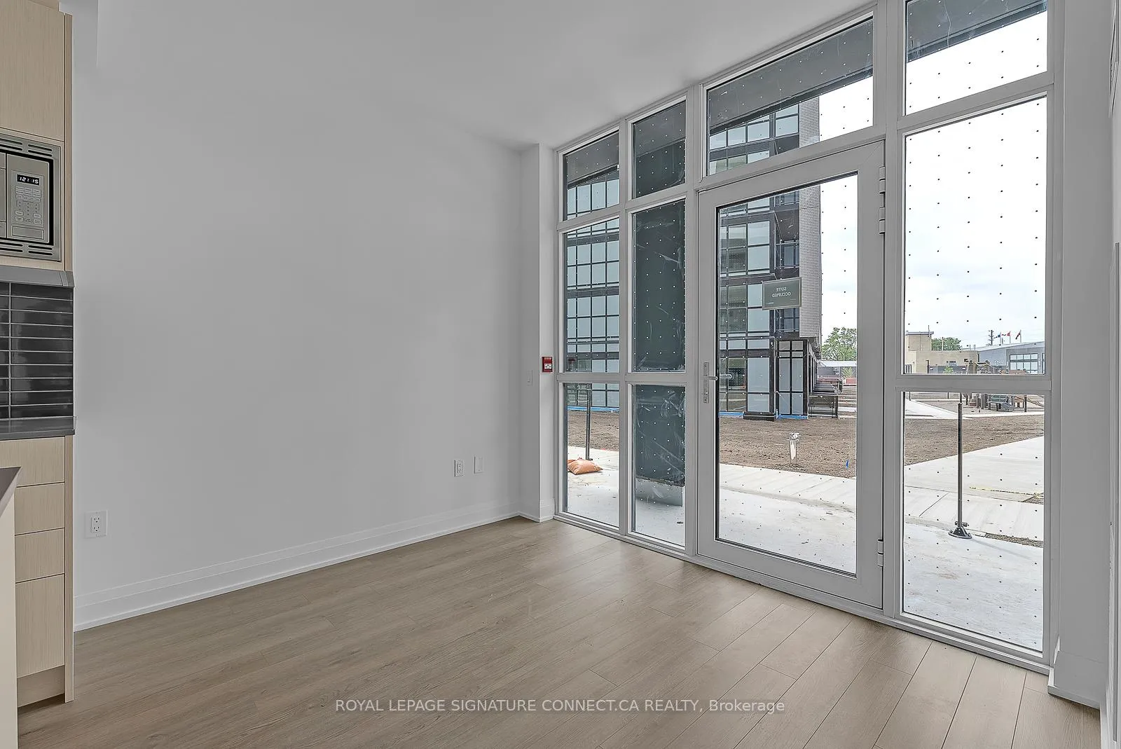 Photo 3 of Unit 111, 60 George Butchart Drive, North York, Downsview-Roding-CFB — HOMEH