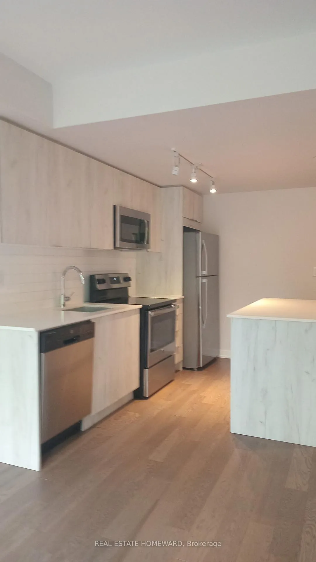 Photo 4 of Unit 102, 1350 Kingston Road, Scarborough, Birchcliffe-Cliffside — HOMEH