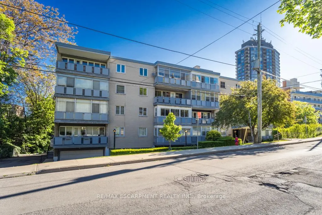 Photo 3 of Unit 404, 107 St. Joseph's Drive, Hamilton, Corktown — HOMEH